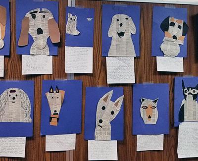 Dog pictures made from torn paper.